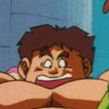 An unknown fighter knocked out of bounds by Trunks