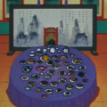 An unknown painting hangs behind Pilaf. The text, even when seen more closely in specific shots, is meaningless gibberish.